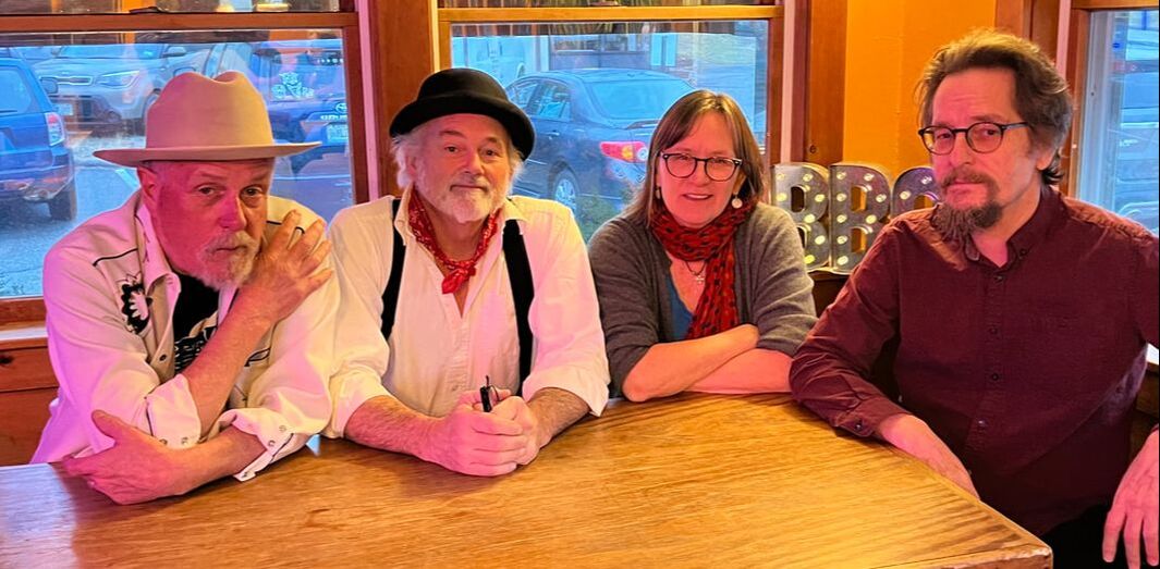 The Bagboys at a pub table — Harvey Bag, Frank Drake, Gretchen Bowder, Jon Ross